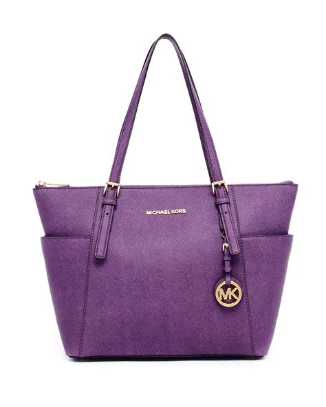 purple michael kors purse with design on front|Michael Kors purple tote bag.